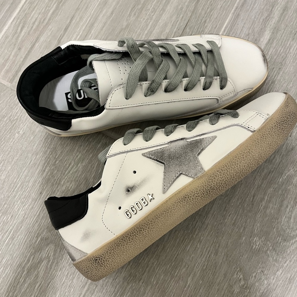 Brand new never worn still in dust bag